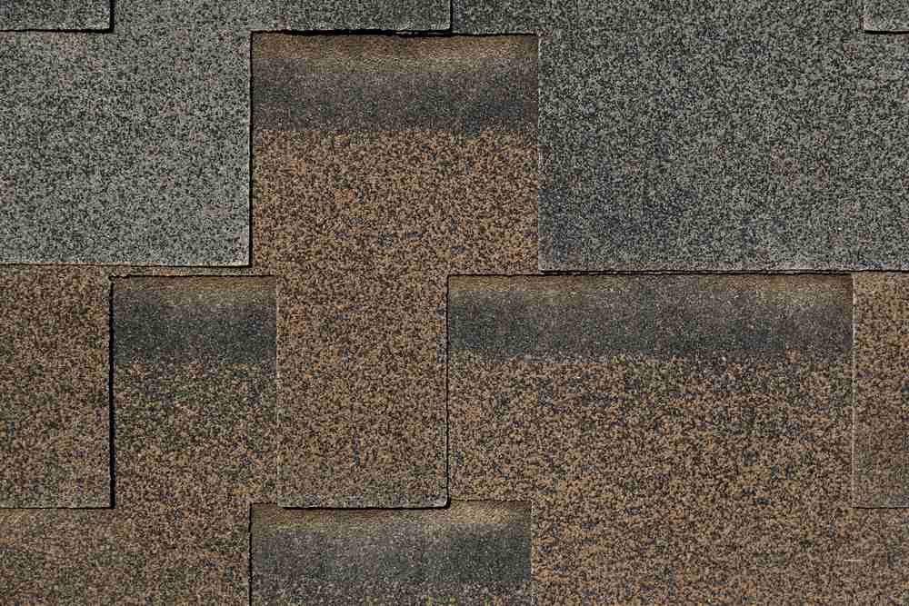 Granule loss on asphalt shingle from hail impact